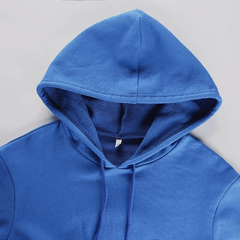 Stylish blue women's sports hoodie with cropped long sleeves, perfect for yoga, fitness, and running. Made from breathable polyester blend.